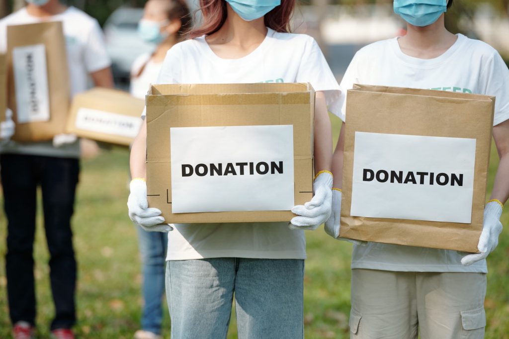 Female Volunteers Collecting Donations